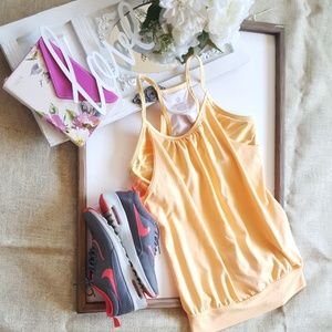 Light tangerine  colored workout top
